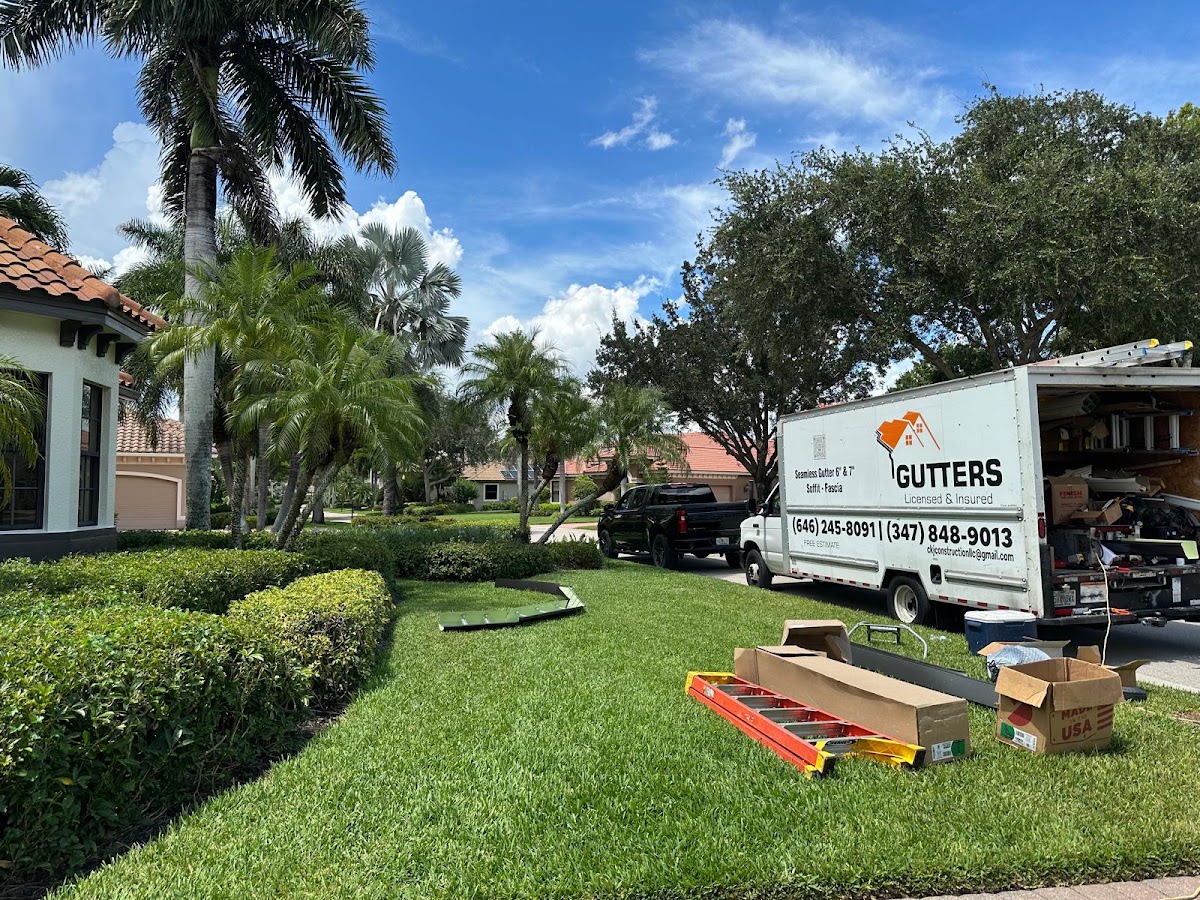 CKJ Construction gutter crew and truck on a job in Southwest Florida